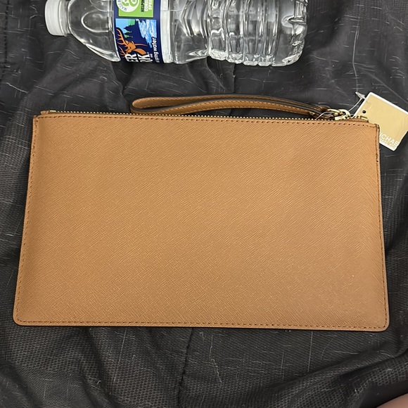 Michael Kors large perf zip clutch new with tag. - Picture 5 of 6